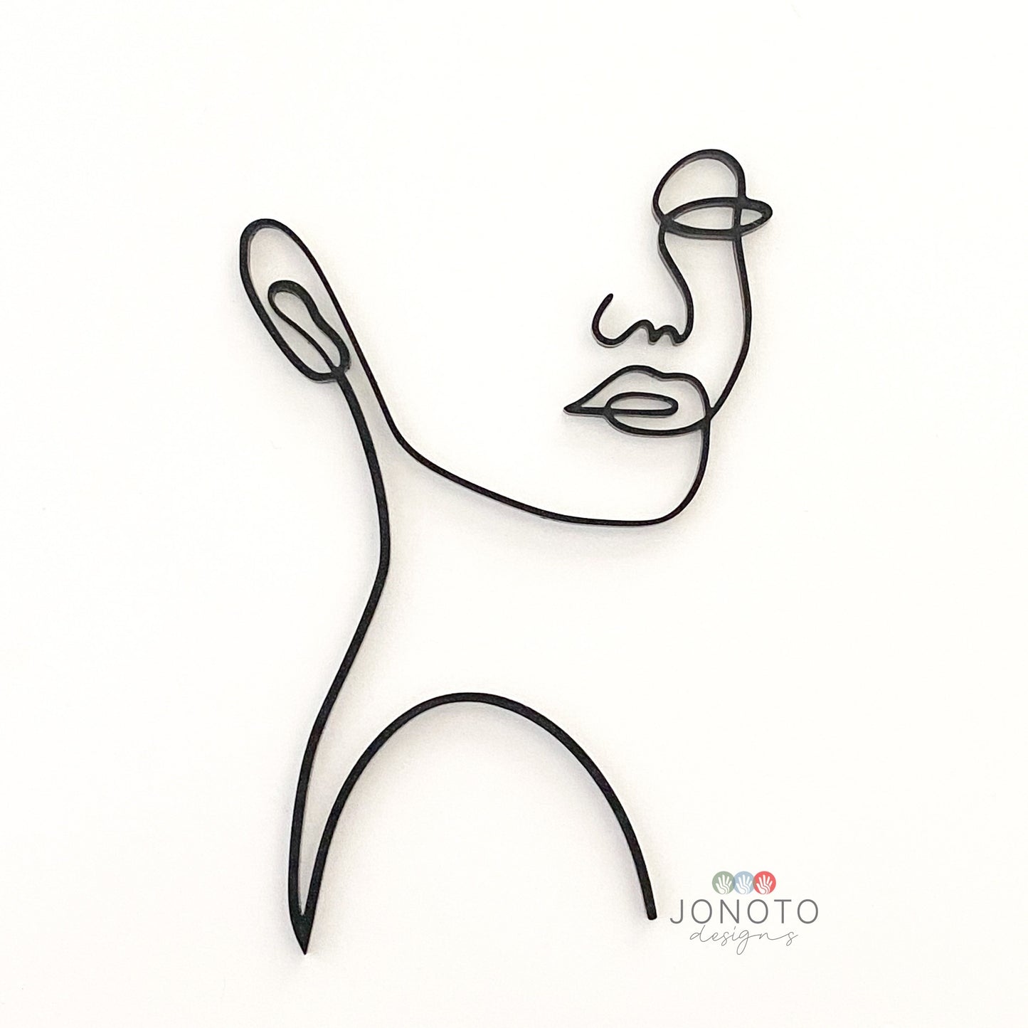 abstract face cake topper with modern design