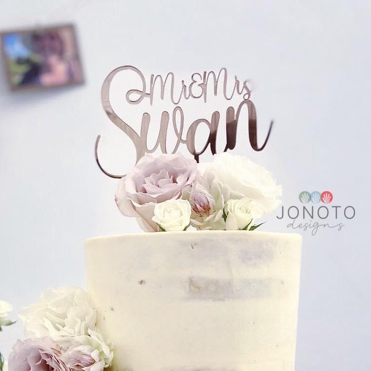 Mr & Mrs wedding cake topper in rose gold acrylic