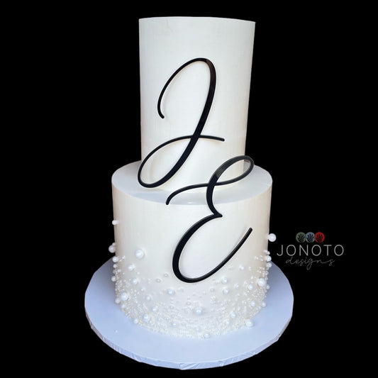 wedding cake with large monogram letters