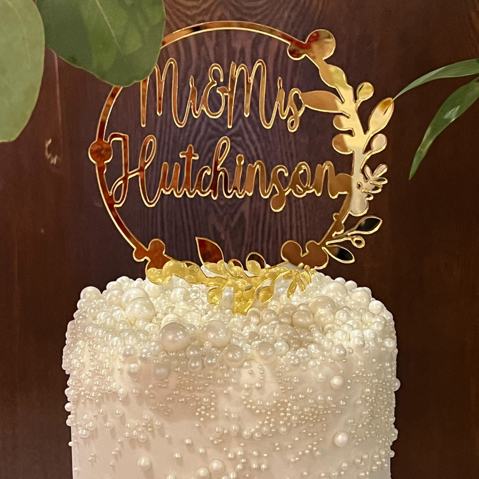 Personalised wedding cake topper in gold mirror acrylic