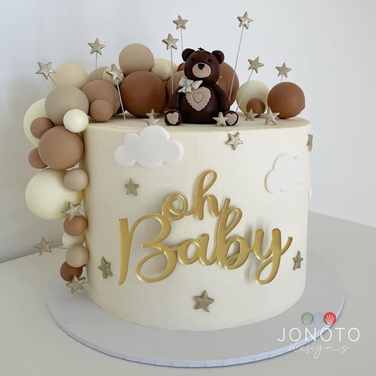 Oh Baby baby shower cake topper in gold mirror acrylic