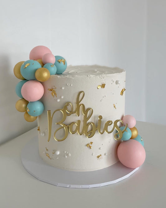 on babies baby shower cake topper in gold mirror acrylic