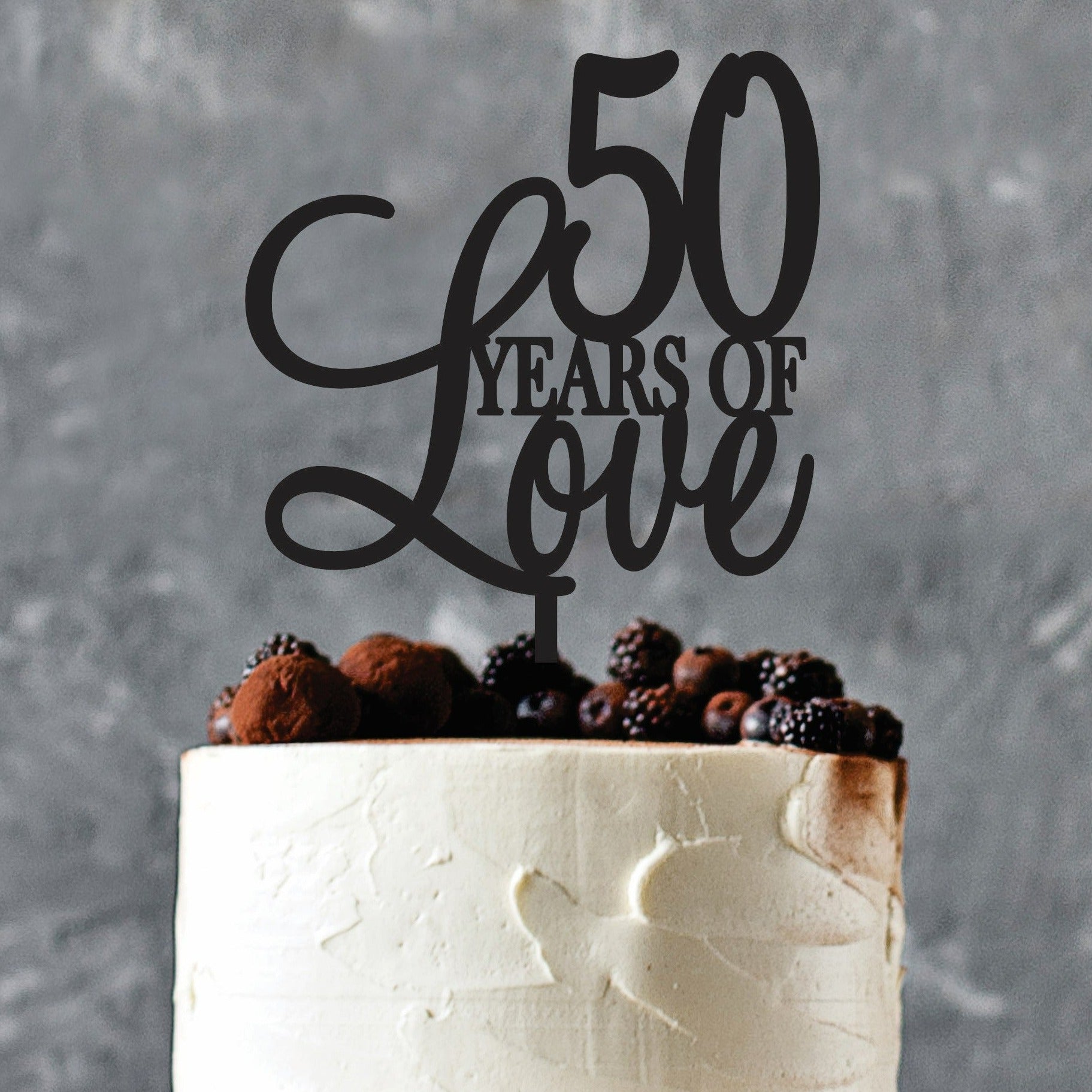 Black 50th wedding anniversary cake topper